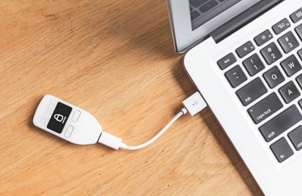 Trezor One plugs into USB