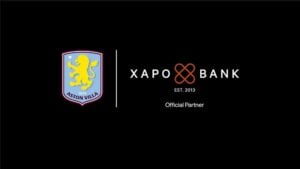 Xapo Bank, the Gibraltar-regulated institution famed for parking customer private keys in Swiss nuclear bunkers, has signed on as an Official Partner of Aston Villa FC, grabbing front-and-center placement on the Premier-League club’s 2025 pre-season training kit and a season-long splash of pitch-side LEDs.