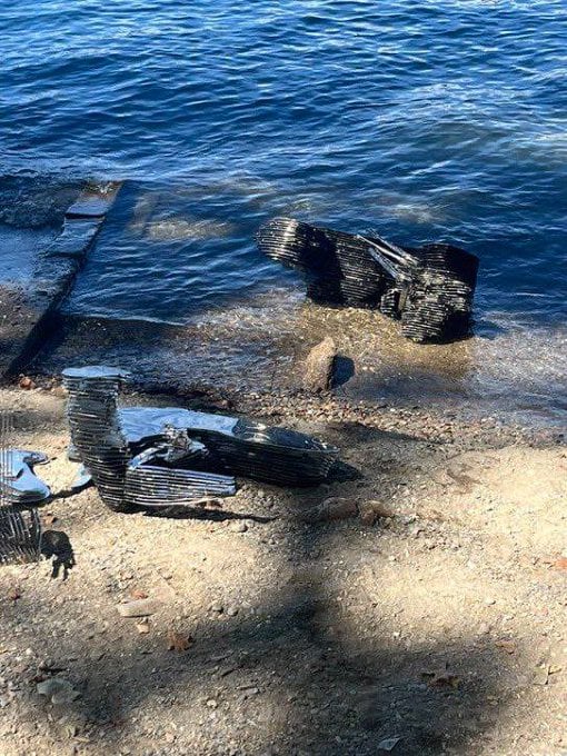 Bitcoin's elusive manufacturer, Satoshi Nakamoto-Part Public Art Installation, Part Crypto Monument's Ab-Aconic Statue was re-introduced by city workers in Lugano, Switzerland, which was re-introduced after being improperly dumped into Lugano.
